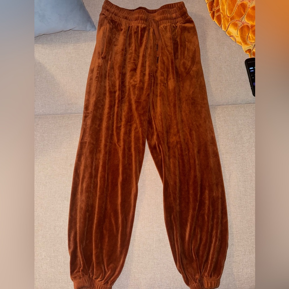 Orange suede joggers with tie and pockets